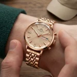 Rose Gold Diamond Accent Stainless Steel Watch with Date Display